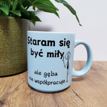 Kubek Pastelowy "Staram się być miły ale gęba nie współpracuje" 330ml